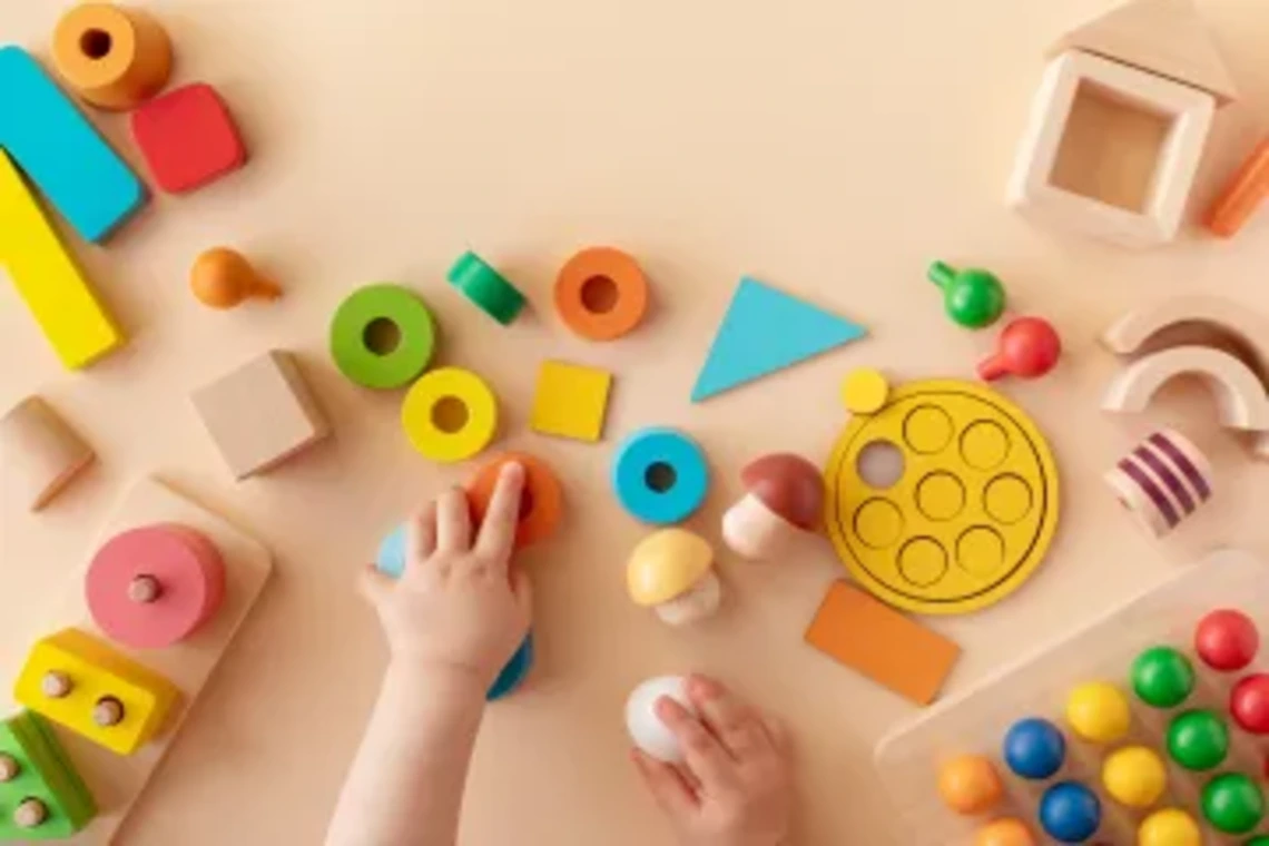 Aerial shot of children playing with building blocks