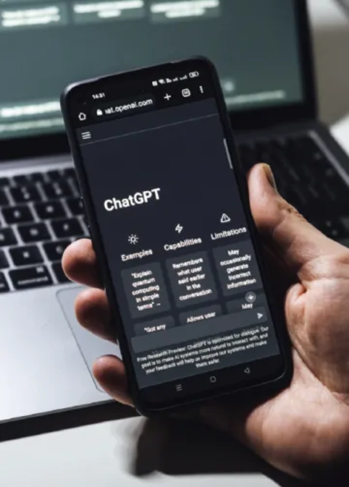 Close up photo of phone using ChatGPT