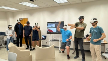 Students trying their XR applications during the implementation phase of their projects